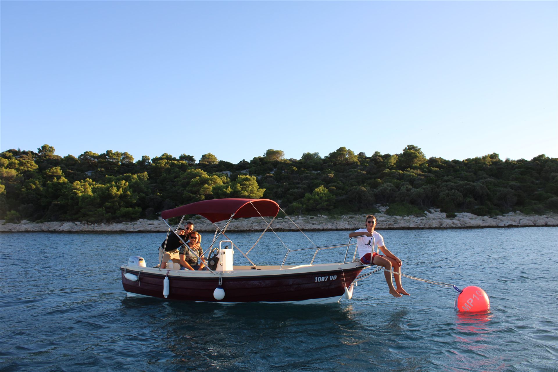 Motorboat exploring the islands and hidden bays around Vodice, Croatia