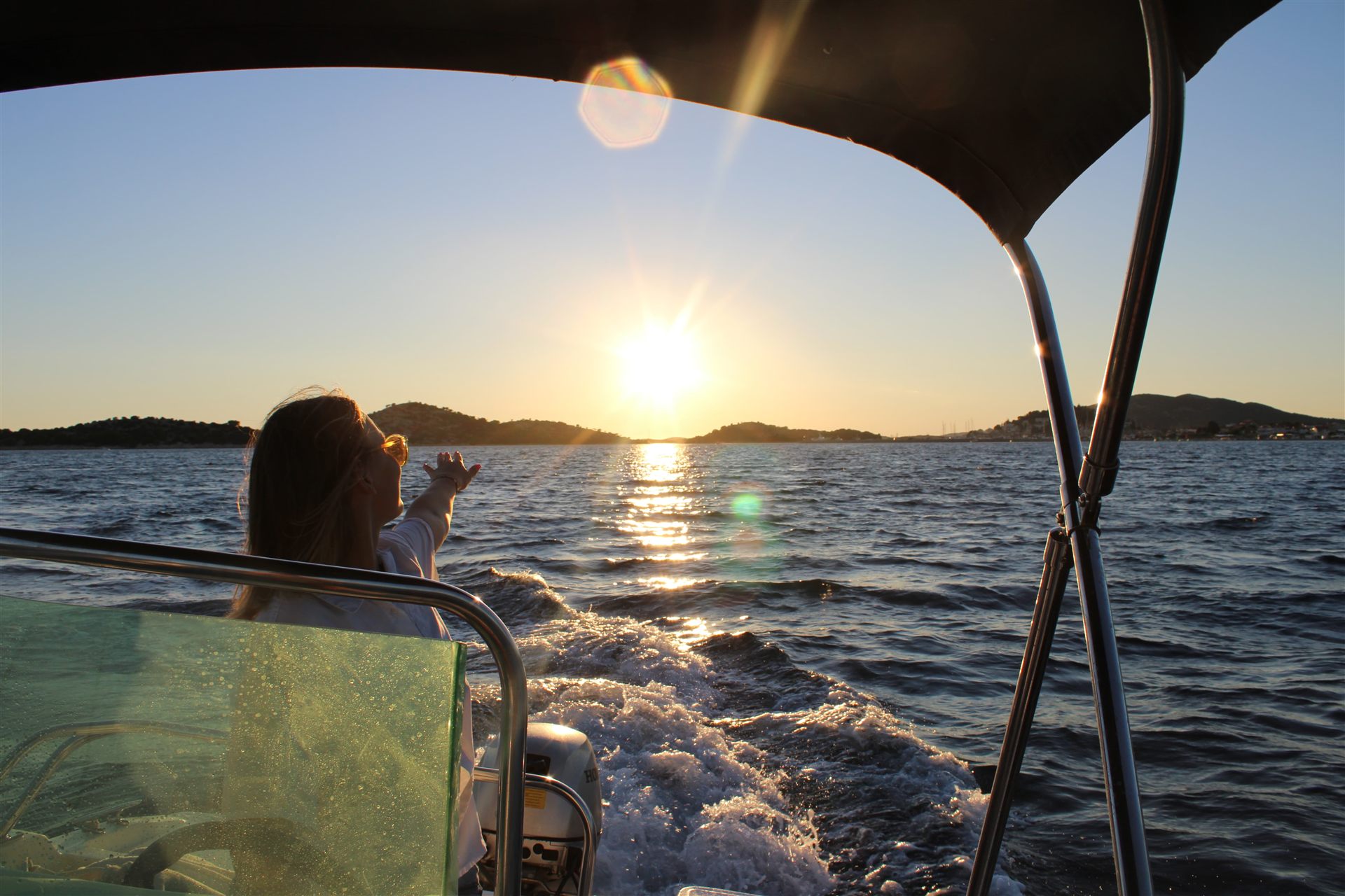 Sunset over the islands around Vodice — view from the boat during the Rentaši sunset tour
