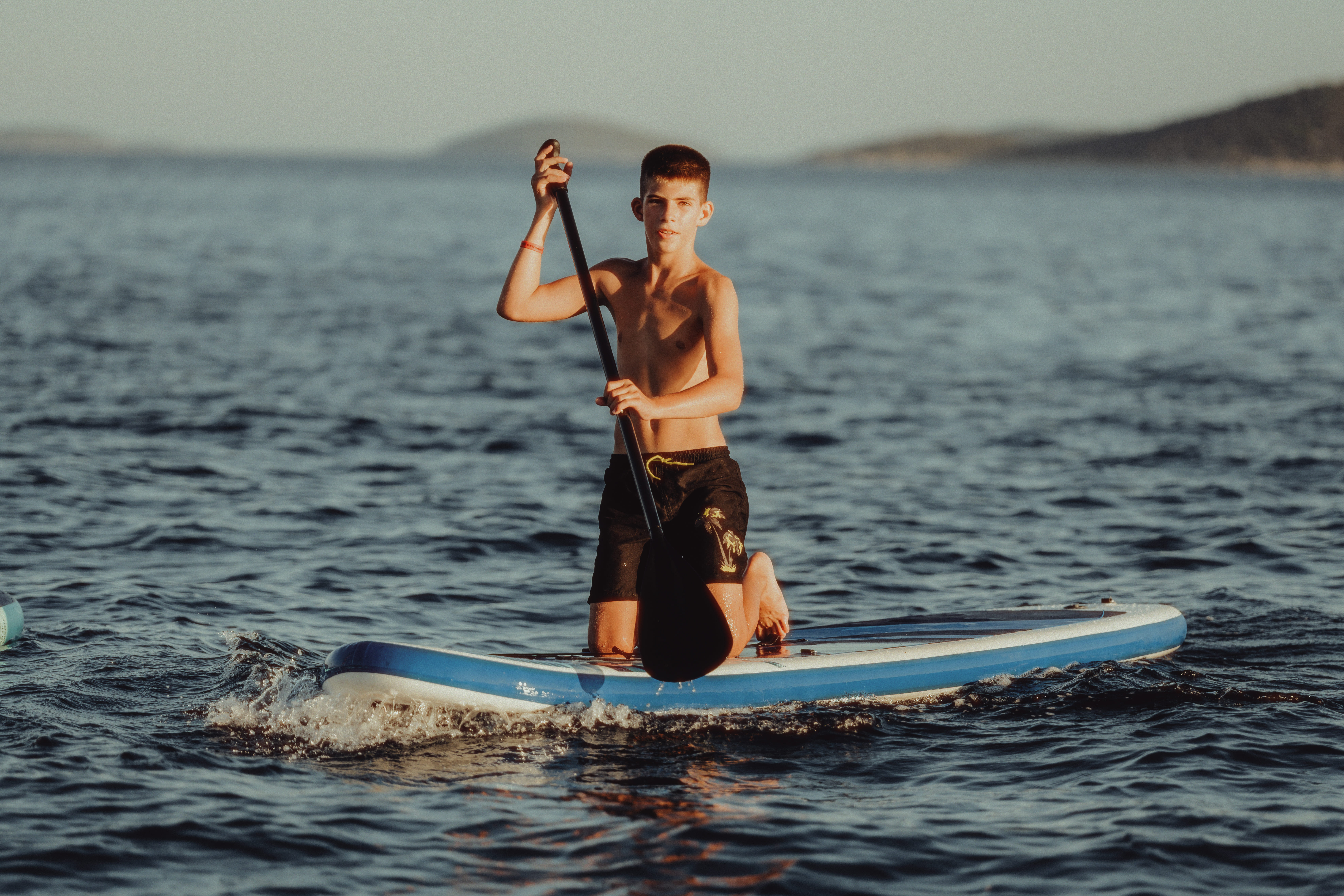 SUP paddling along the coast of Vodice, Dalmatia, Croatia